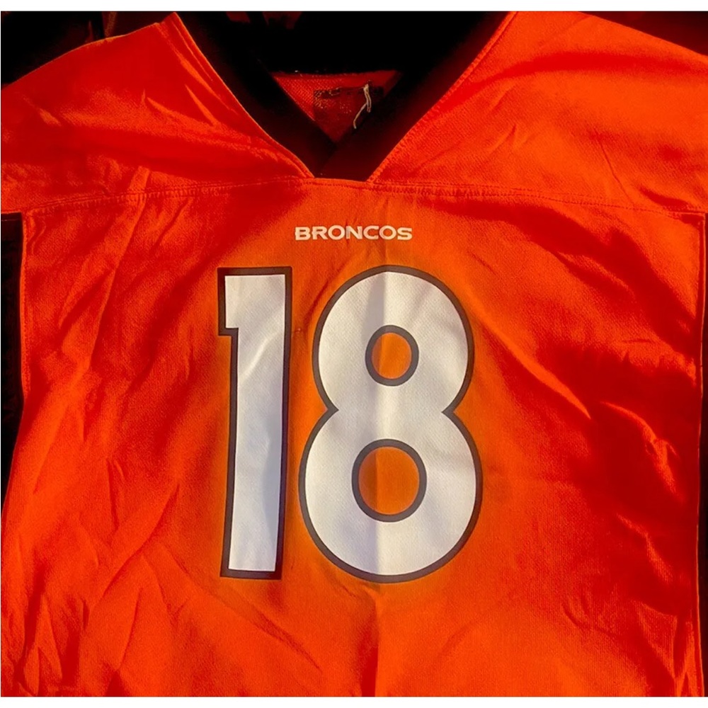 Broncos Orange Peyton Manning Signed and authenticated Jersey (PENDING SALE)